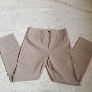 Khaki, stretchy dress pants with ankle slit detail